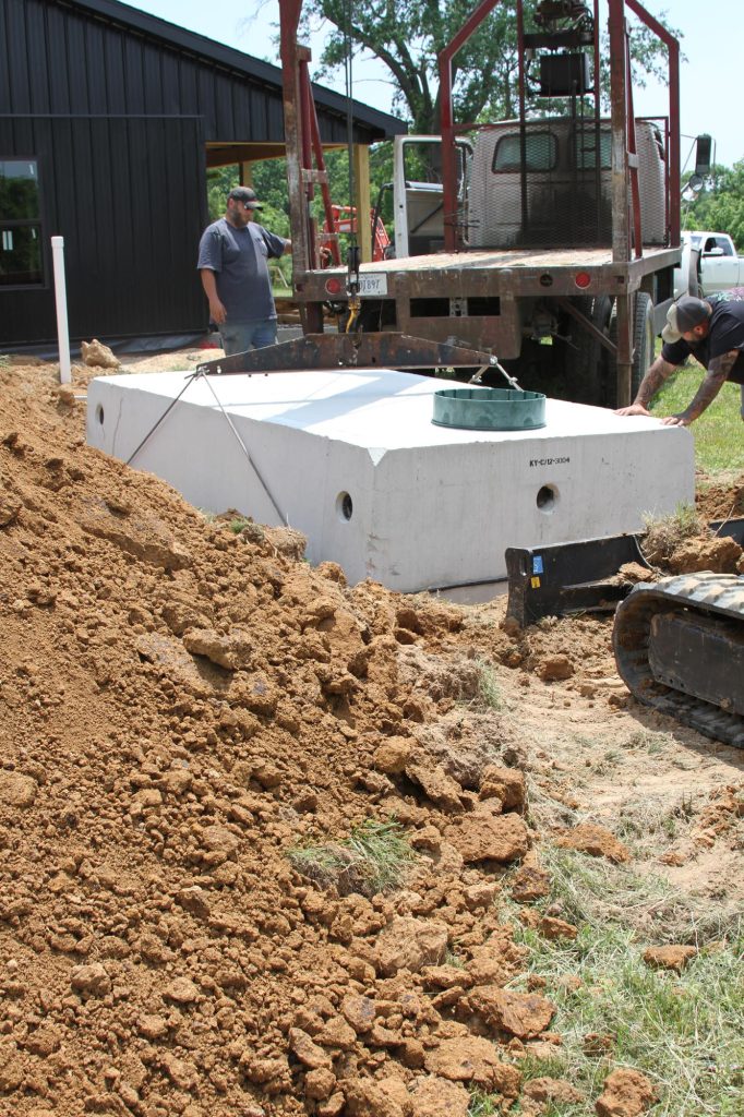 Placing a septic tank for a new septic system install
